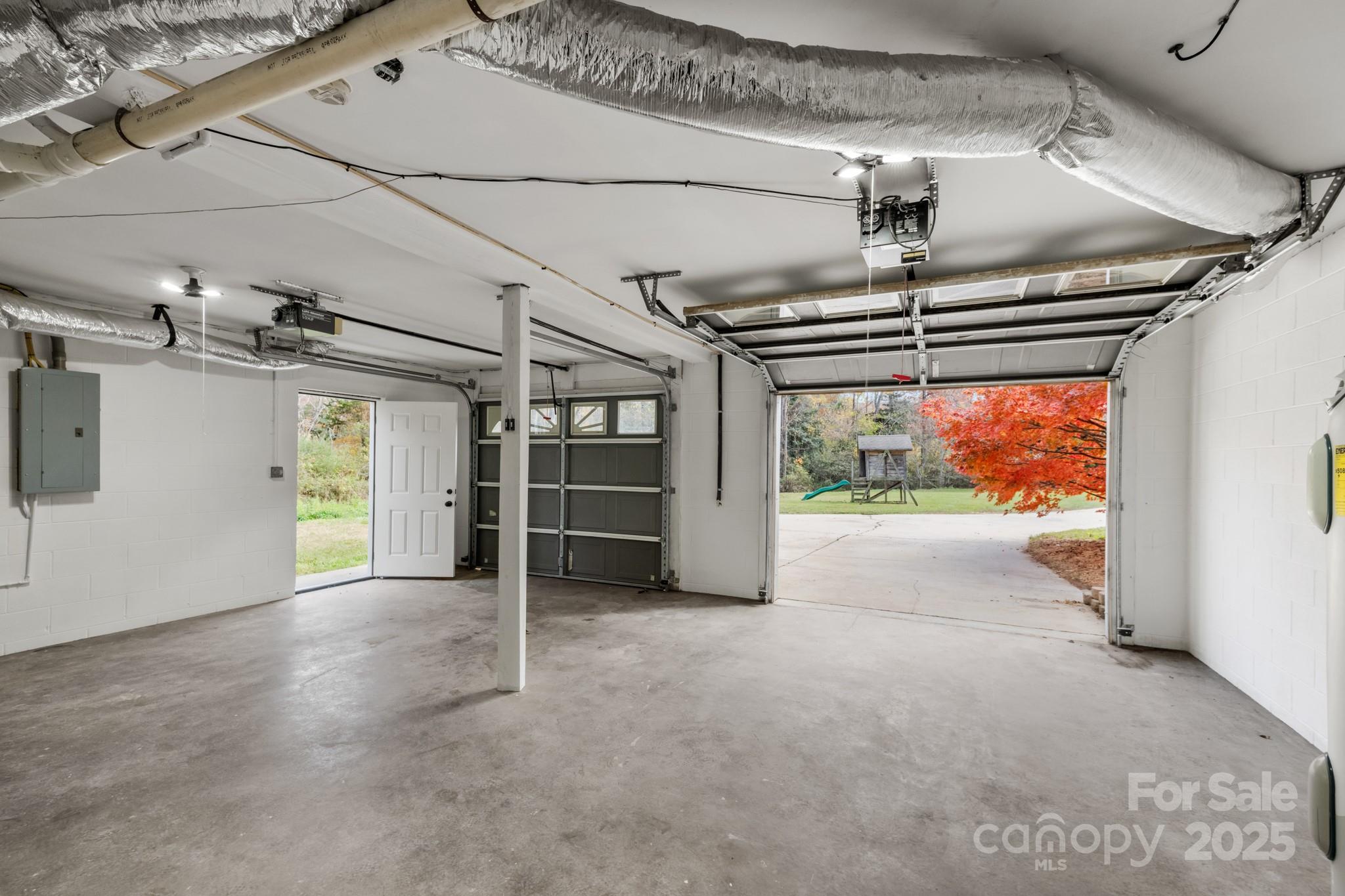2830 Ellerwood Road Hudson, NC 28638 - Photo 43 of 46 a view of empty room with wooden walls