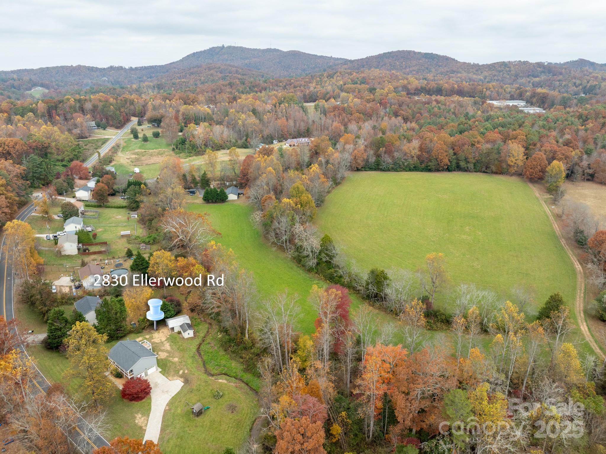 2830 Ellerwood Road Hudson, NC 28638 - Photo 10 of 46 a view of a lake with mountains in the background