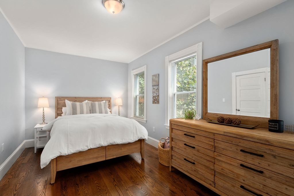 103 Dix Street, Unit 2 Boston, MA 02122 - Photo 11 of 23 a bedroom with a bed and window