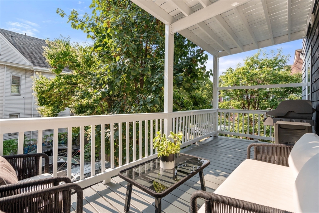 103 Dix Street, Unit 2 Boston, MA 02122 - Photo 17 of 23 a view of a chairs and table in the patio