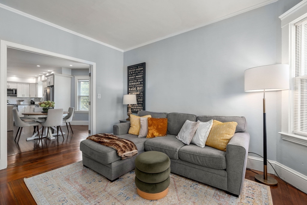 103 Dix Street, Unit 2 Boston, MA 02122 - Photo 6 of 23 a living room with furniture and a lamp