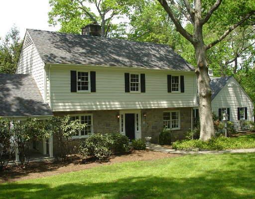 75 Sawmill Road Stamford, CT 06903 - Photo 1 of 1 front view of a house with a yard