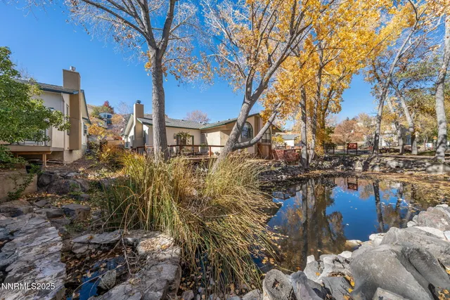 a view of a lake with a house