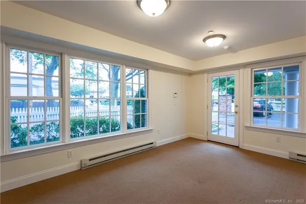 an empty room with windows