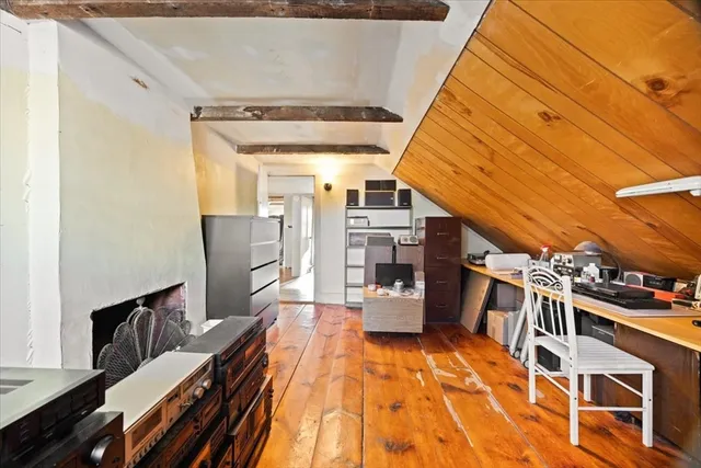 a view of a living room with a washer and dryer