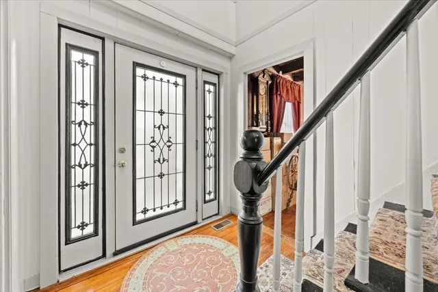 a view of an entryway with staircase