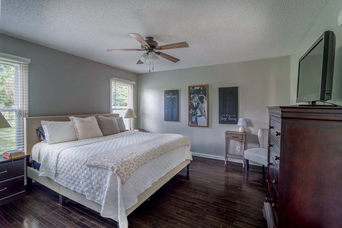 883 South Ridge Trail Clarksville, TN 37043 - Photo 15 of 42 Large primary bedroom off the living room with hardwood floors!