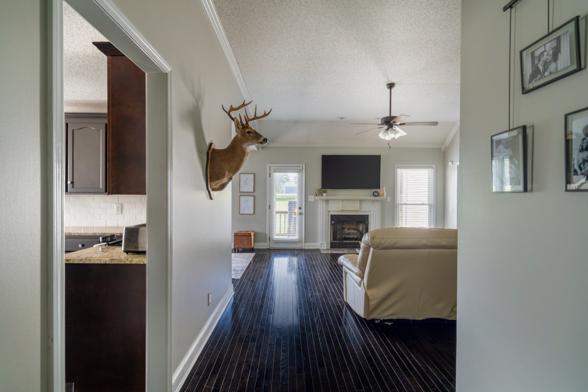 883 South Ridge Trail Clarksville, TN 37043 - Photo 6 of 42 Enter into your foyer with stunning hardwoods and calming neutral paint