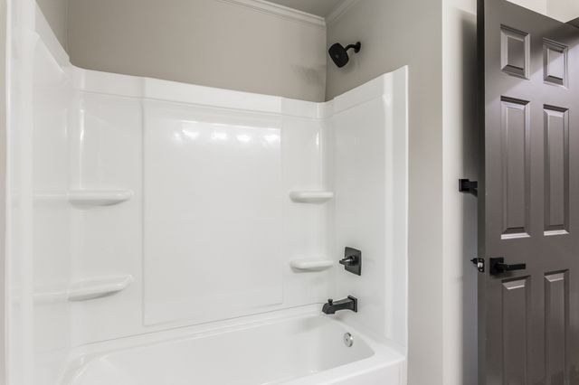 a bathroom with a bathtub