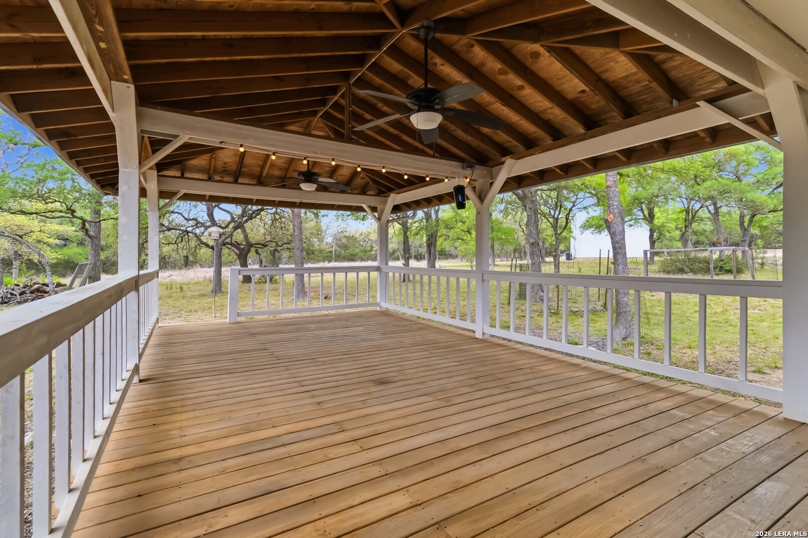 31949 Oak Ridge Parkway Bulverde, TX 78163 - Photo 22 of 50 a view of porch with wooden floor