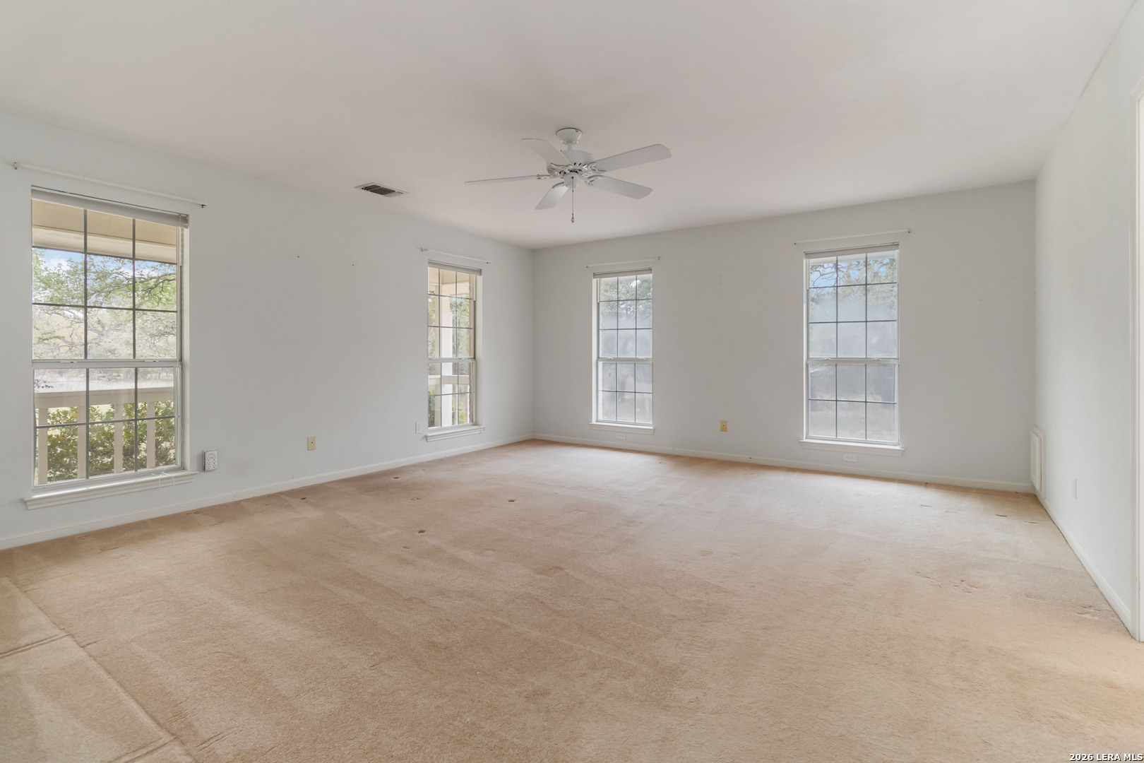 31949 Oak Ridge Parkway Bulverde, TX 78163 - Photo 23 of 50 a view of an empty room with a window