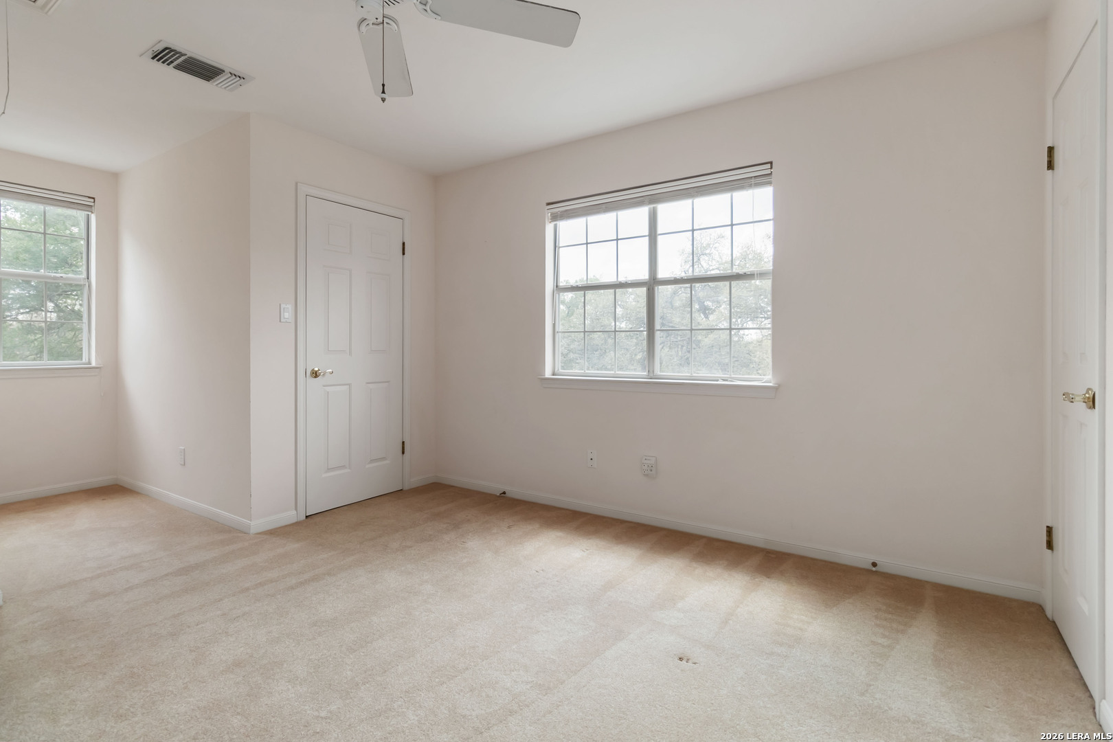 31949 Oak Ridge Parkway Bulverde, TX 78163 - Photo 28 of 50 an empty room with windows