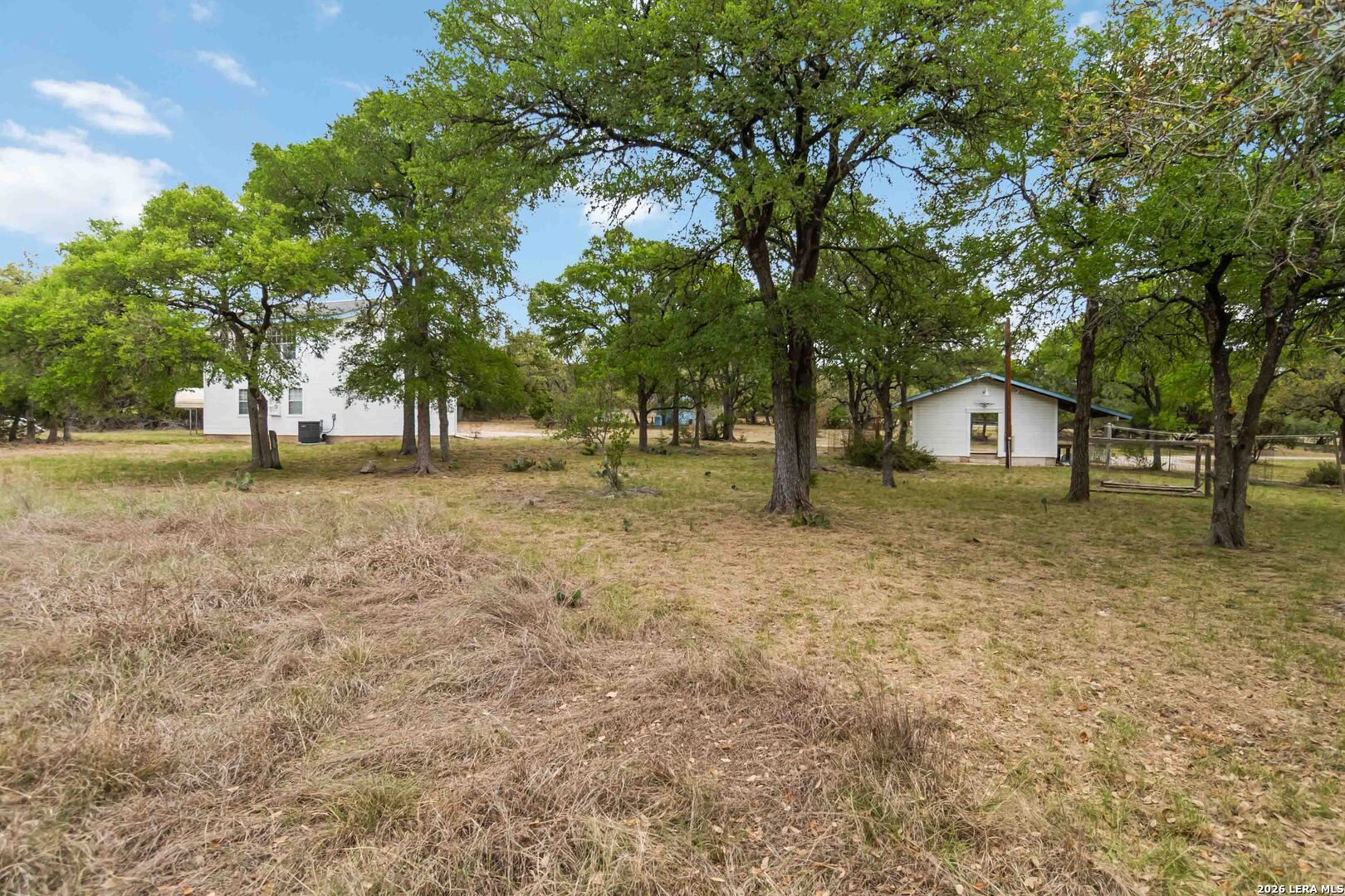 31949 Oak Ridge Parkway Bulverde, TX 78163 - Photo 46 of 50 a view of a yard with tree s