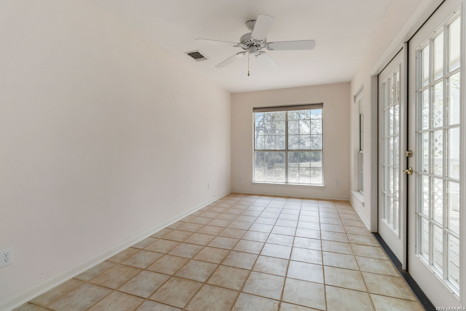 31949 Oak Ridge Parkway Bulverde, TX 78163 - Photo 10 of 50 a view of an empty room with a window