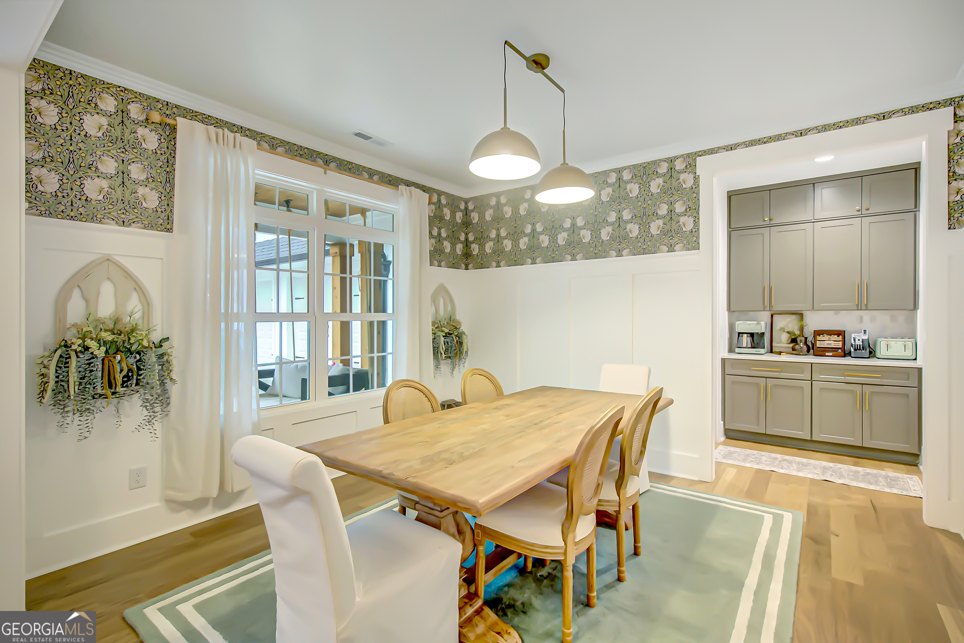140 South Alexander Creek Road Newnan, GA 30263 - Photo 22 of 67 a view of a dining room with furniture window and wooden floor