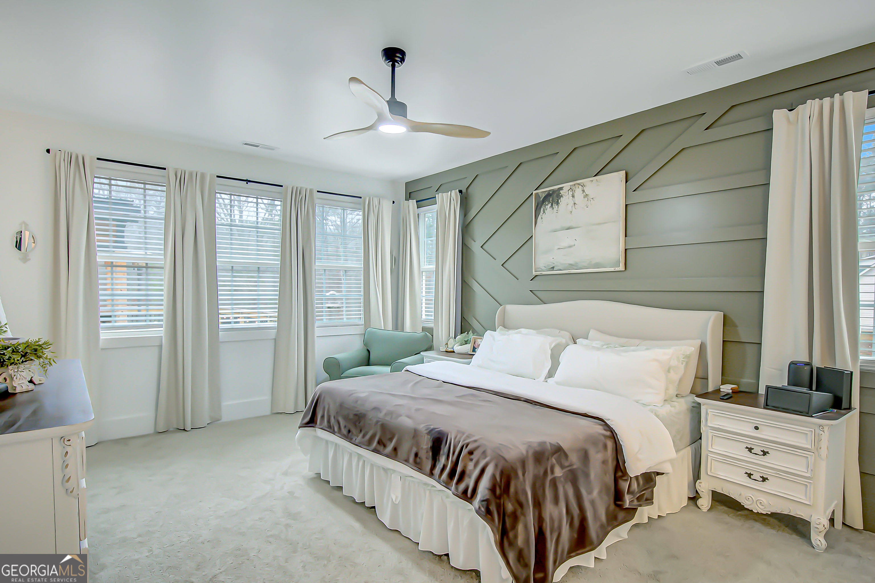 140 South Alexander Creek Road Newnan, GA 30263 - Photo 25 of 67 a spacious bedroom with a bed and a window