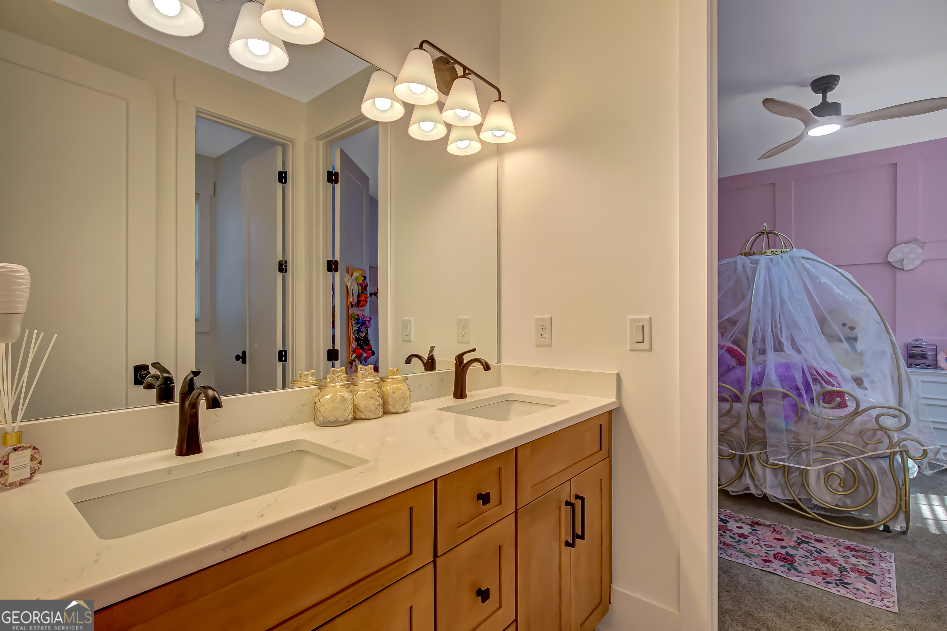 140 South Alexander Creek Road Newnan, GA 30263 - Photo 33 of 67 a bathroom with a sink vanity and a mirror