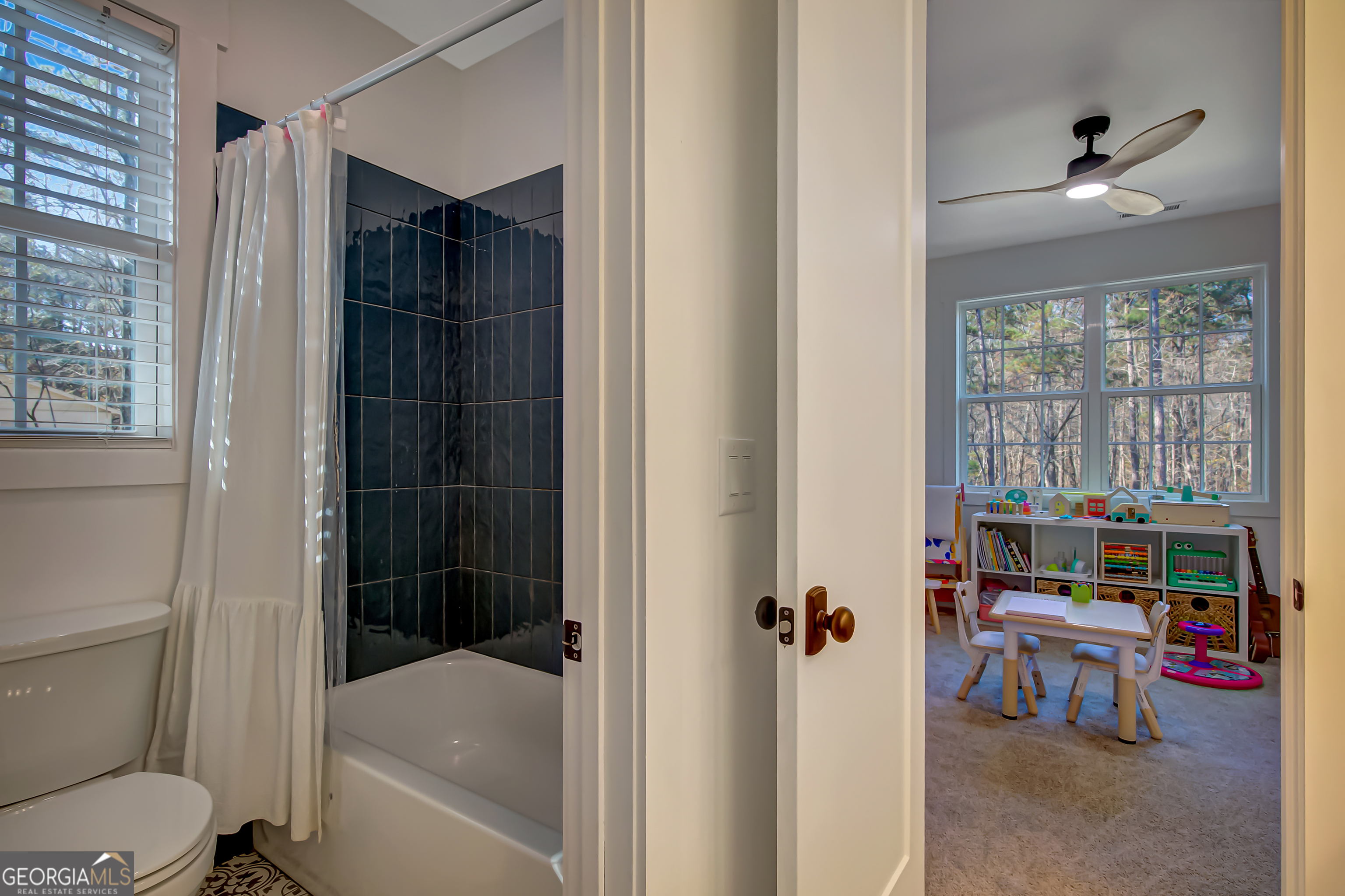 140 South Alexander Creek Road Newnan, GA 30263 - Photo 34 of 67 a bathroom with a sink toilet and shower