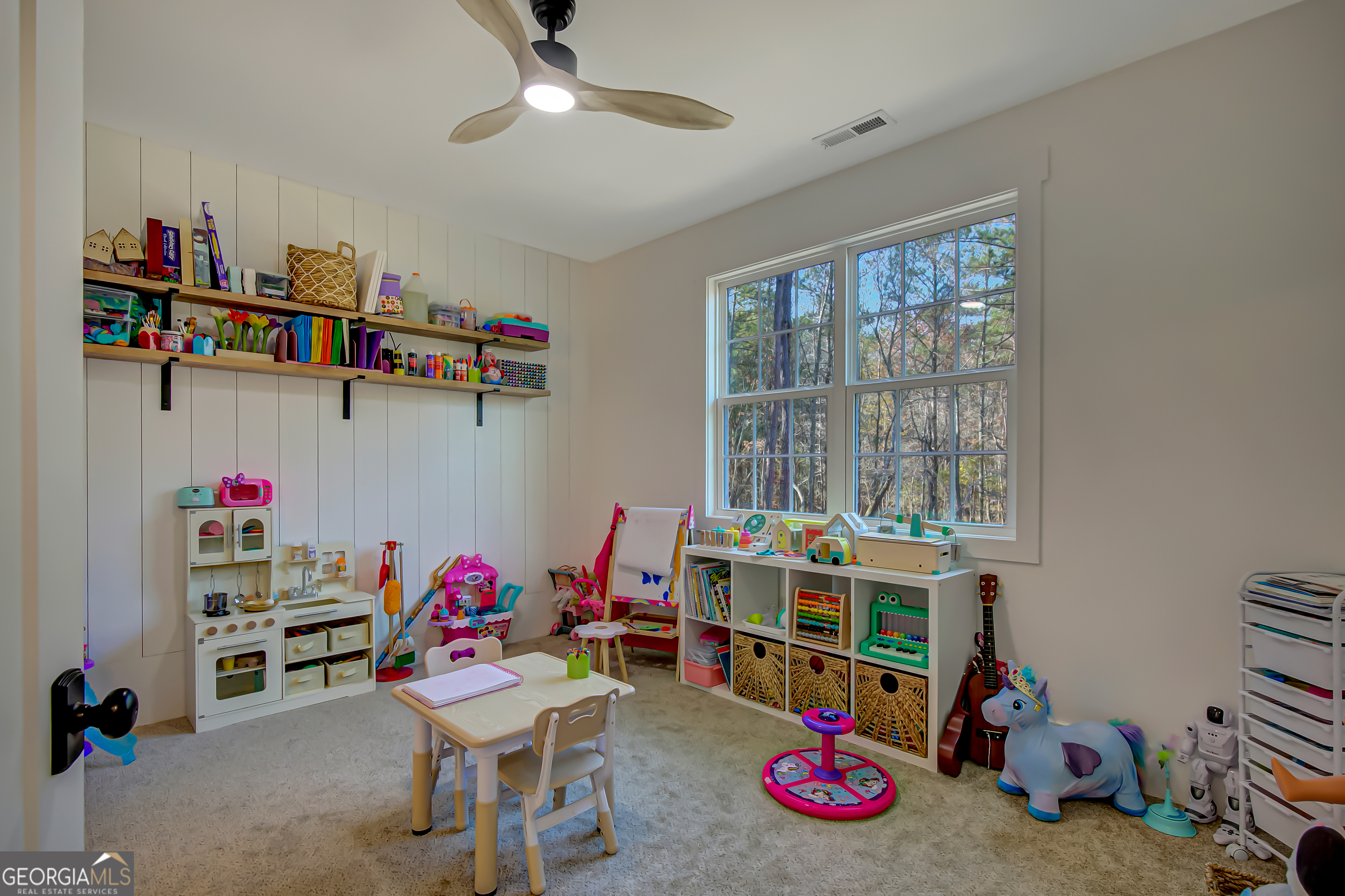 140 South Alexander Creek Road Newnan, GA 30263 - Photo 36 of 67 a playing room with furniture and a window