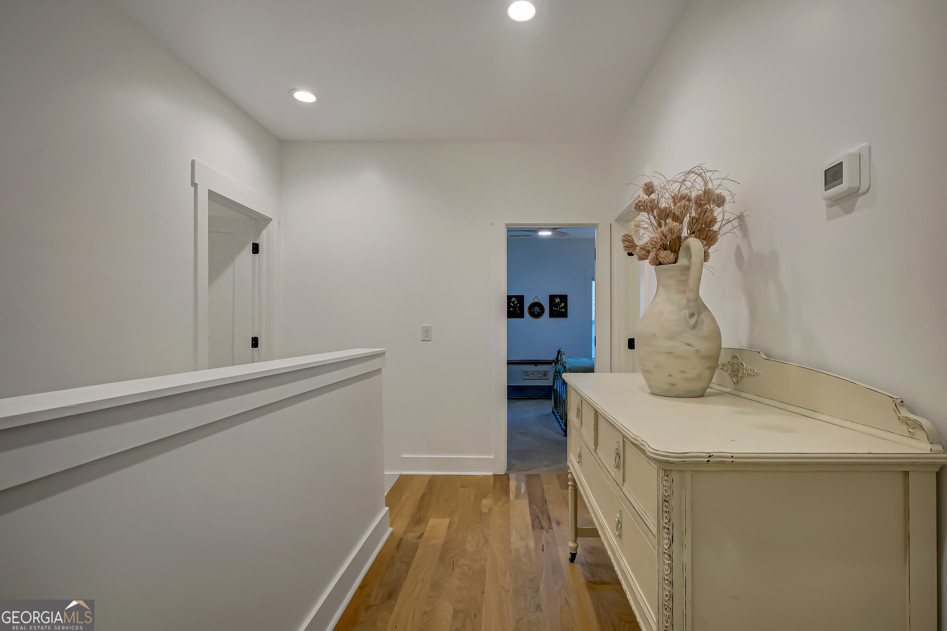 140 South Alexander Creek Road Newnan, GA 30263 - Photo 45 of 67 a bathroom with a sink a mirror and vanity