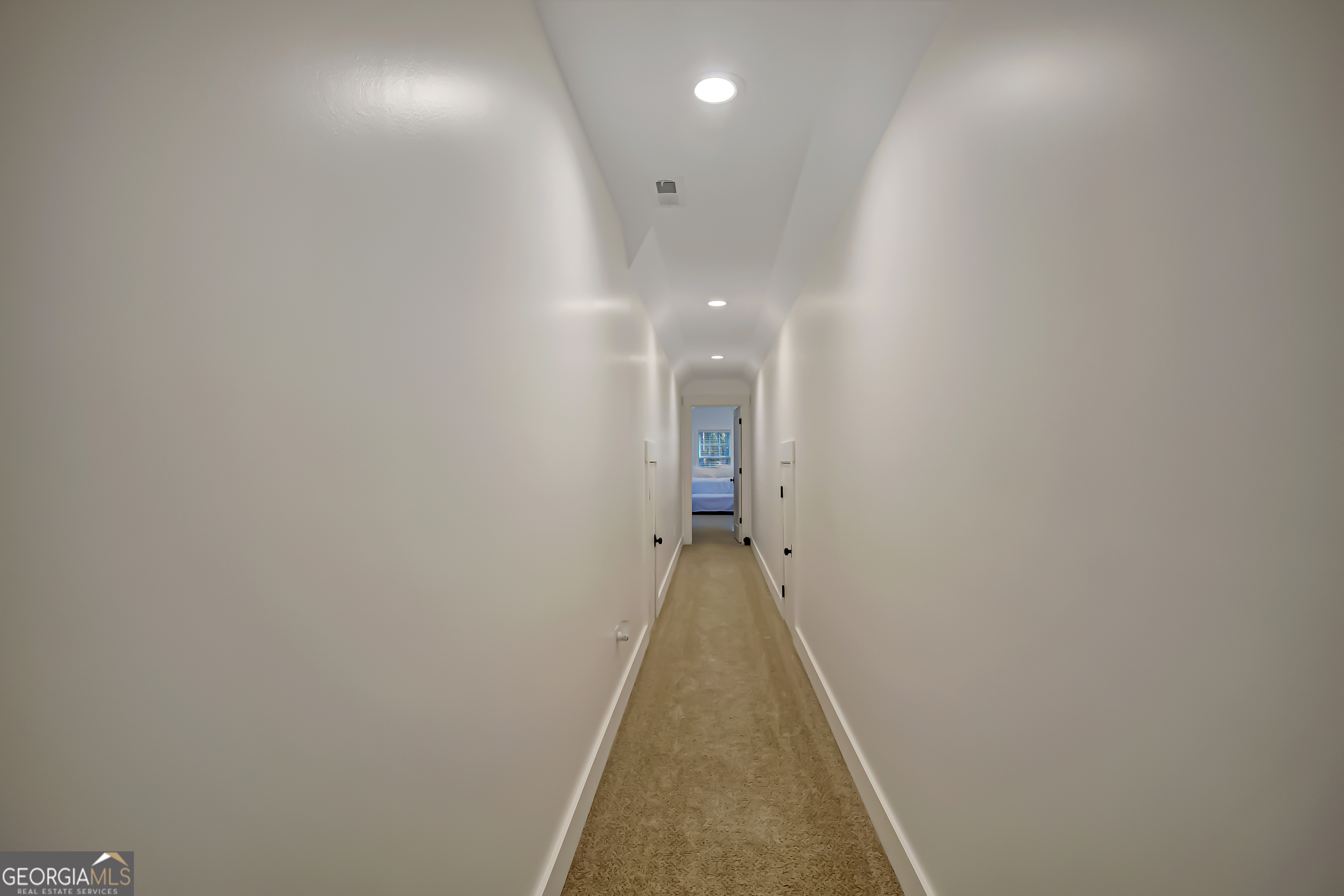 140 South Alexander Creek Road Newnan, GA 30263 - Photo 50 of 67 a view of a hallway with a white walls