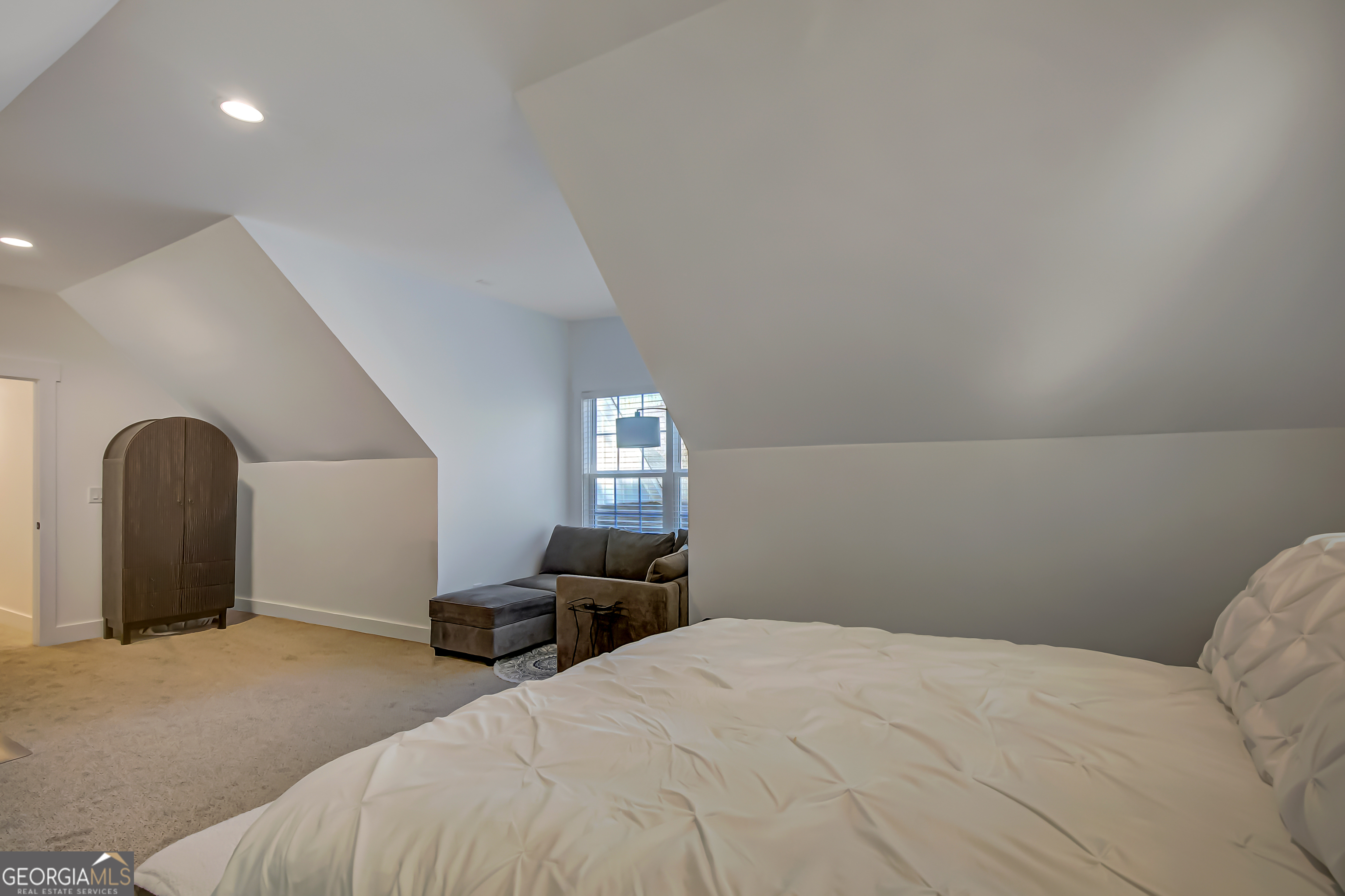 140 South Alexander Creek Road Newnan, GA 30263 - Photo 52 of 67 a bedroom with a bed and a window