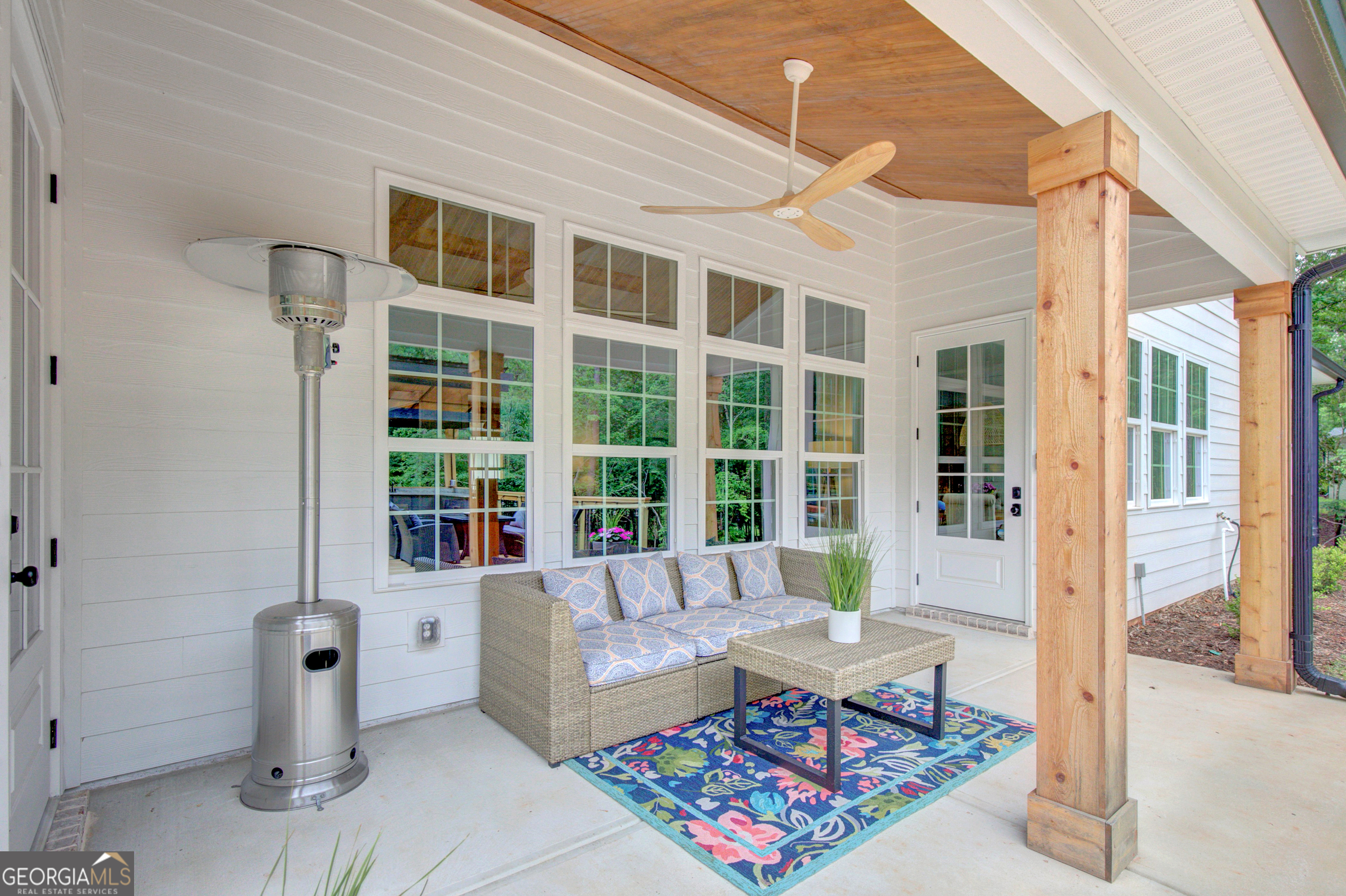 140 South Alexander Creek Road Newnan, GA 30263 - Photo 56 of 67 a living room with furniture and a window