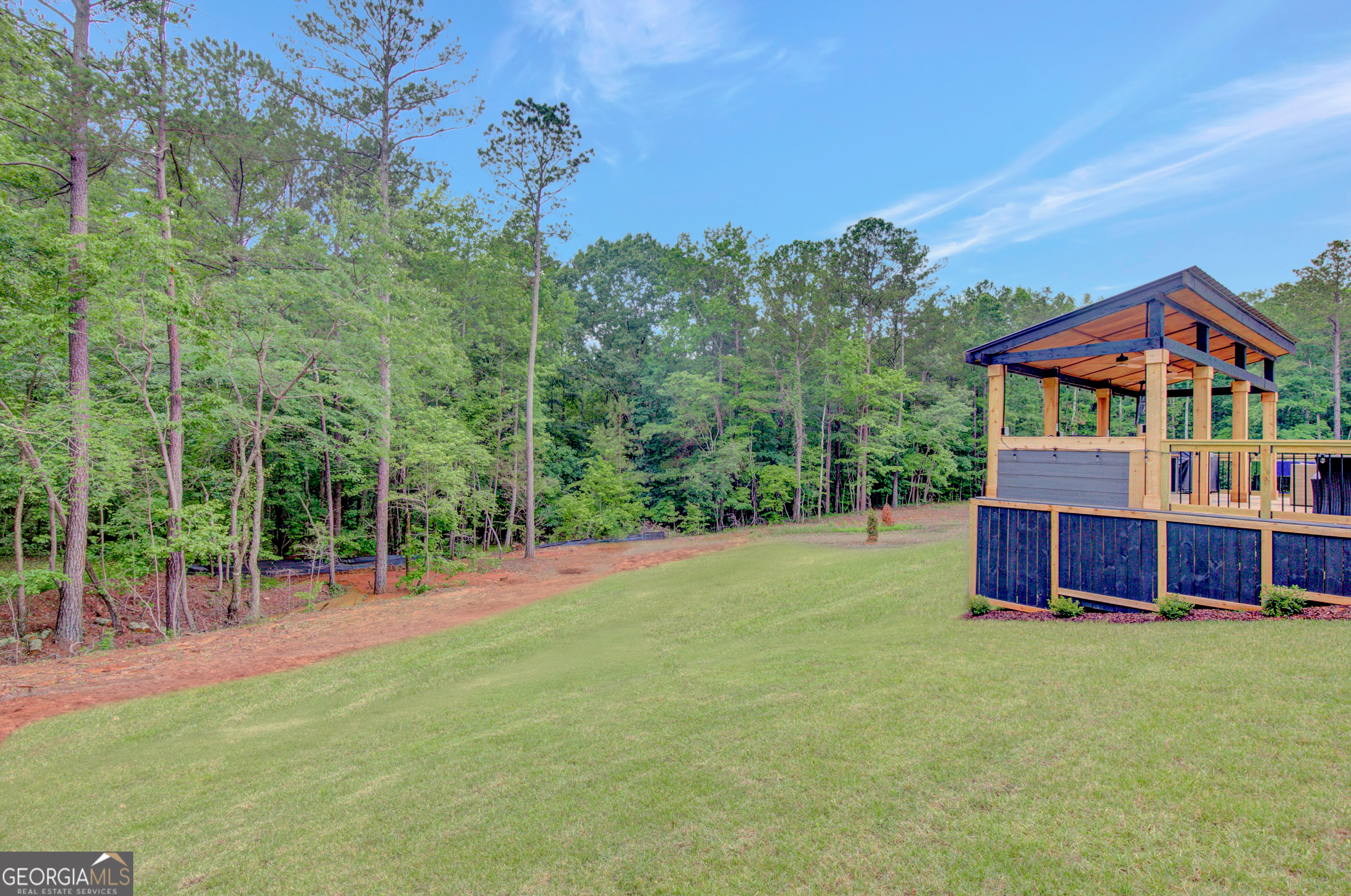 140 South Alexander Creek Road Newnan, GA 30263 - Photo 61 of 67 a view of a house with pool and a yard