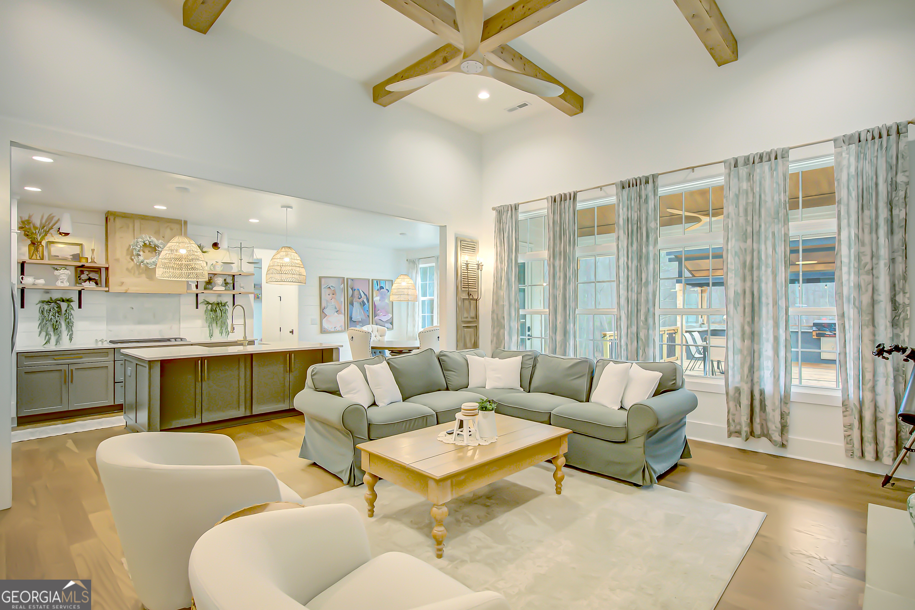 140 South Alexander Creek Road Newnan, GA 30263 - Photo 8 of 67 a living room with furniture and a large window