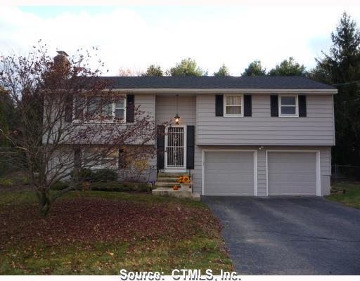 55 Ashley Road Bristol, CT 06010 - Photo 1 of 1 a front view of house with a garden