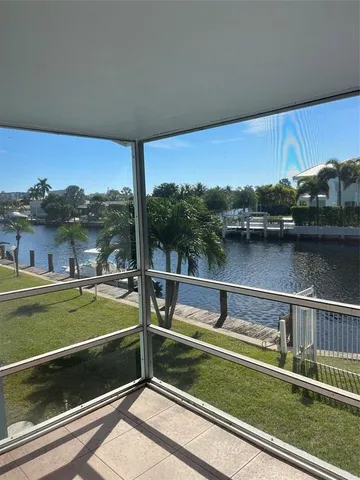 a view of swimming pool from a balcony