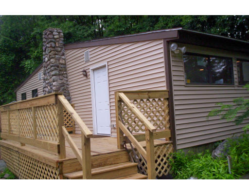 3 Valley Road Holbrook, MA 02343 - Photo 12 of 12 a view of house with backyard and seating space