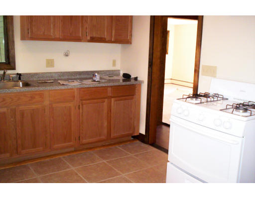 3 Valley Road Holbrook, MA 02343 - Photo 5 of 12 a kitchen with stainless steel appliances granite countertop a refrigerator and a stove