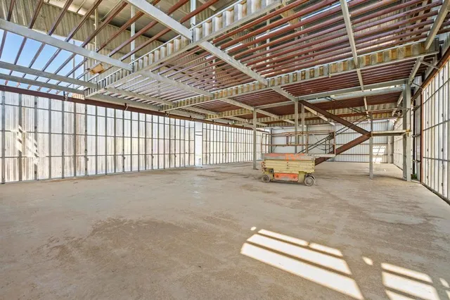 a view of empty room with racks