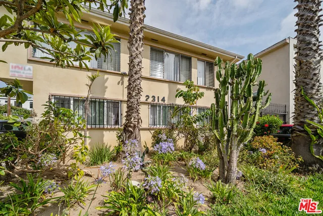 front view of a house with a small yard