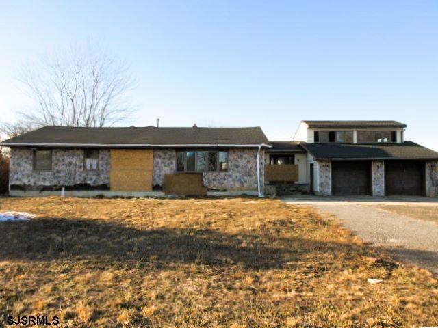 975 12th Street Hammonton, NJ 08037 - Photo 1 of 31 a front view of a house with a yard