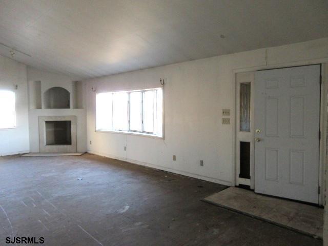 975 12th Street Hammonton, NJ 08037 - Photo 2 of 31 an empty room with windows