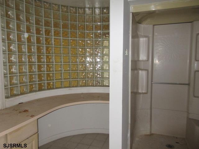 975 12th Street Hammonton, NJ 08037 - Photo 21 of 31 a bathroom with a bathtub and shower