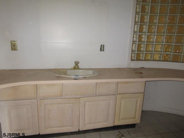 975 12th Street Hammonton, NJ 08037 - Photo 22 of 31 a bathroom with a sink and cabinets