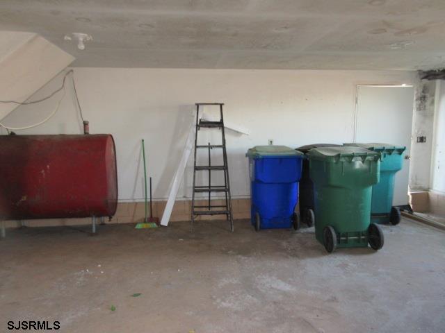 975 12th Street Hammonton, NJ 08037 - Photo 26 of 31 a room with a washing machine and a bookshelf