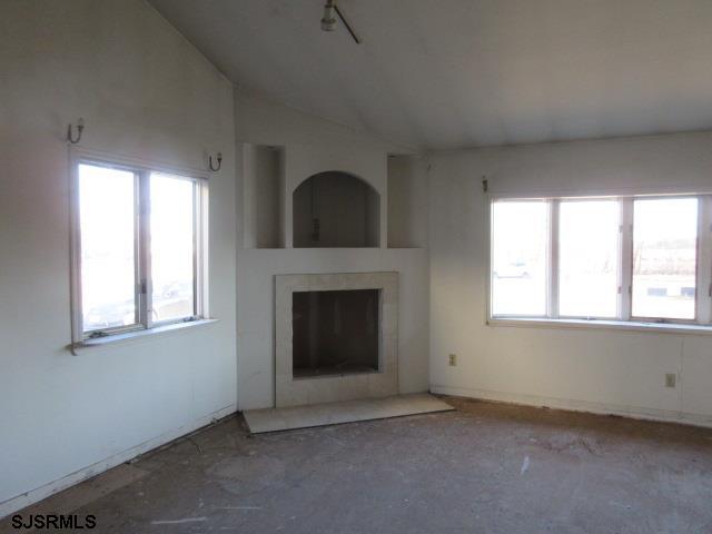 975 12th Street Hammonton, NJ 08037 - Photo 4 of 31 an empty room with windows