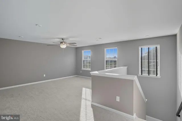 a view of workspace with furniture and window