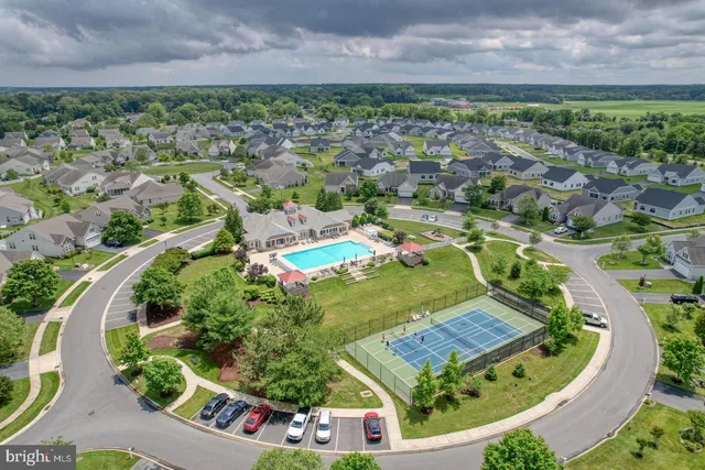 an aerial view of a house with a garden