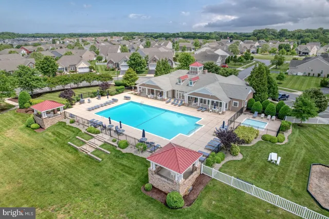 an aerial view of a house with a garden