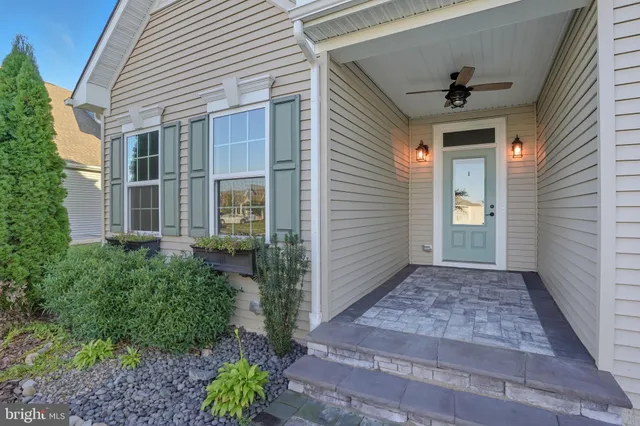 a view of a pathway besides a house