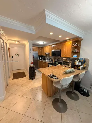 $265,000 | 5501 Northwest 7th Street, Unit E207, Miami, FL 33126