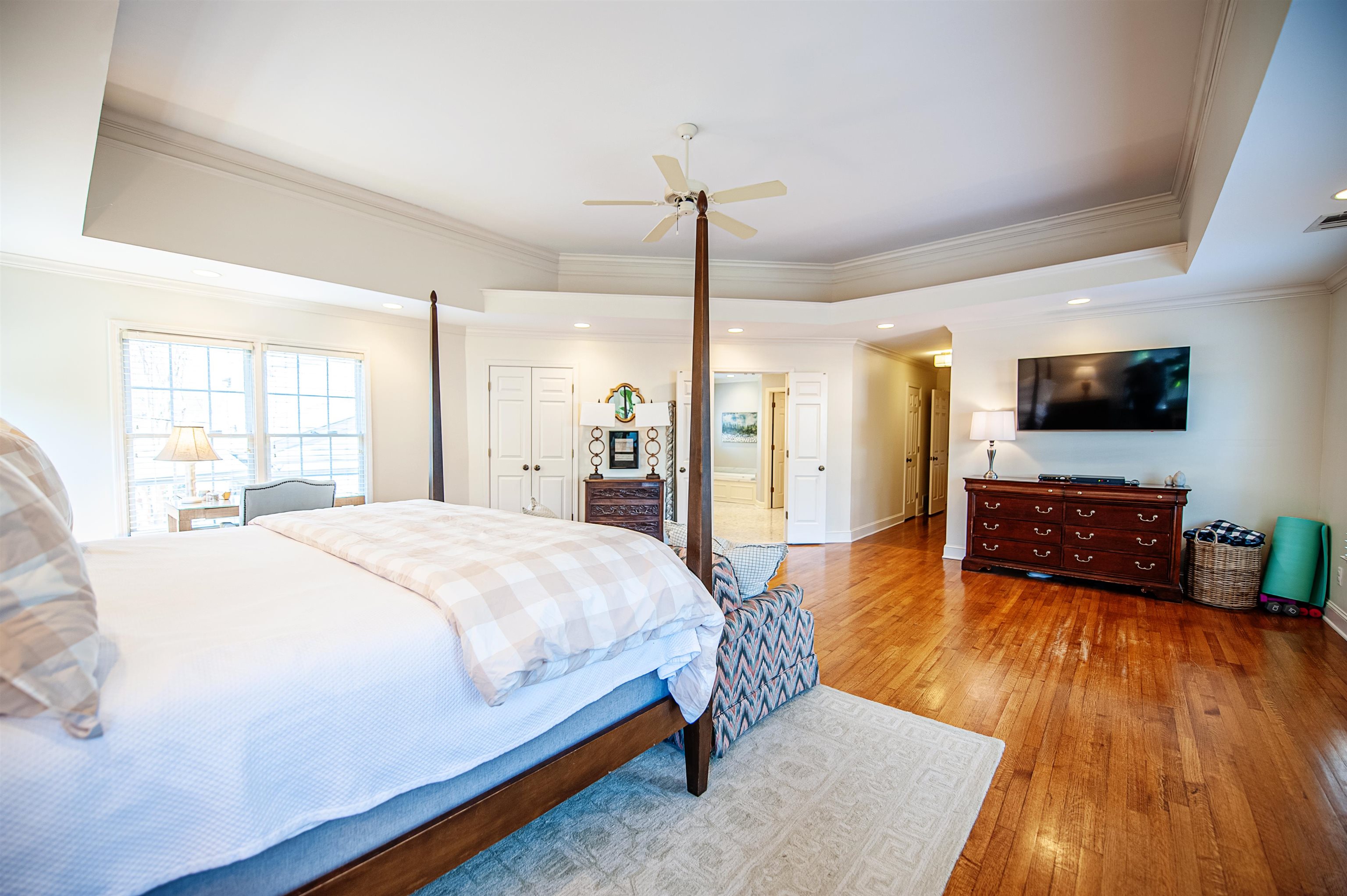 5431 South Angela Road Memphis, TN 38120 - Photo 11 of 25 a spacious bedroom with a bed and a flat screen television