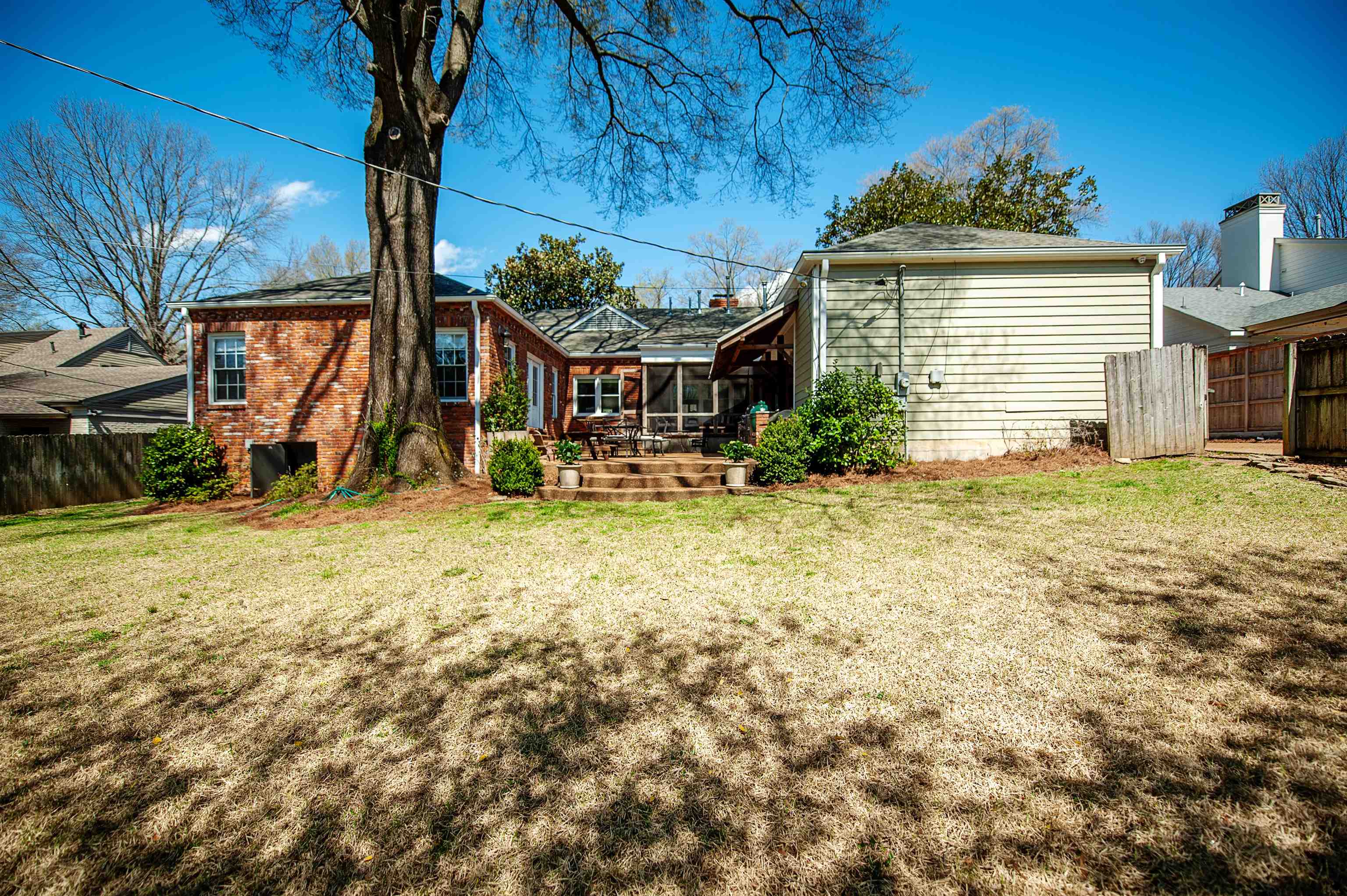 5431 South Angela Road Memphis, TN 38120 - Photo 25 of 25 a view of a house with a yard