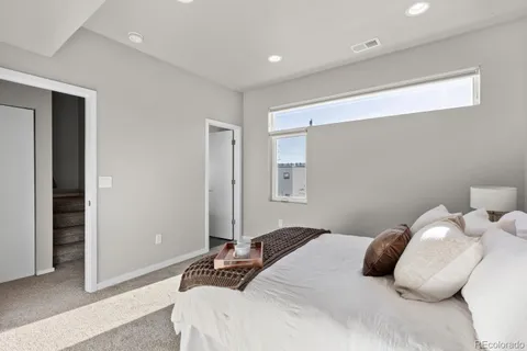 a bathroom with a shower and toilet