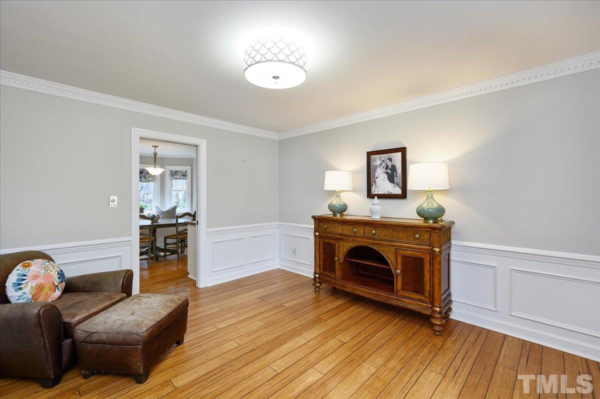 5101 Fielding Drive Raleigh, NC 27606 - Photo 19 of 32 a living room with furniture and a fireplace